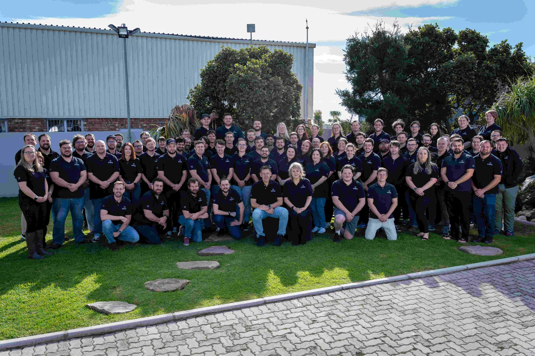 The whole COMPRSA team outside our Port Elizabeth office